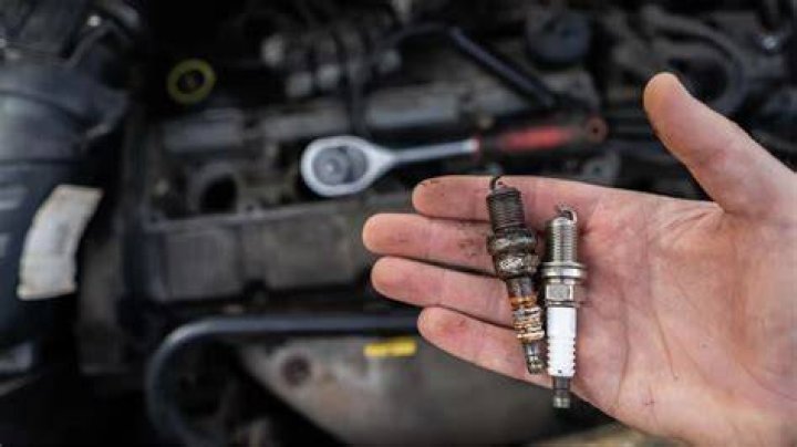 Can bad spark plugs cause a gas smell?