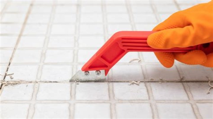 Does acid wash remove grout?