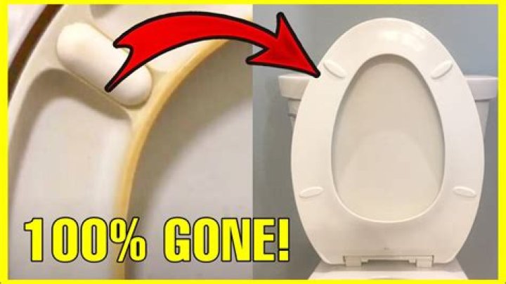 How do I get my plastic toilet seat white again?