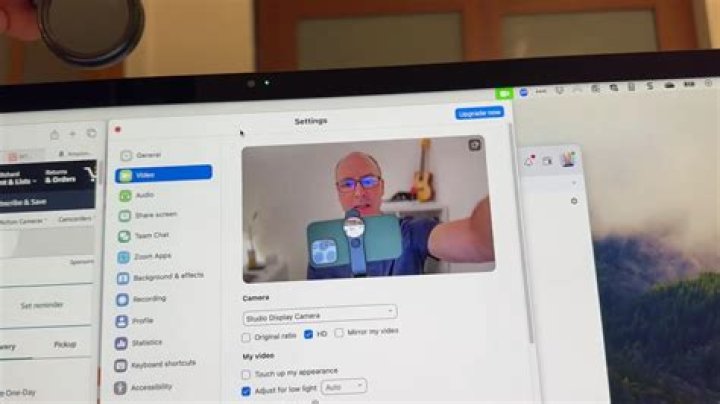 How do I reduce glare on my webcam?