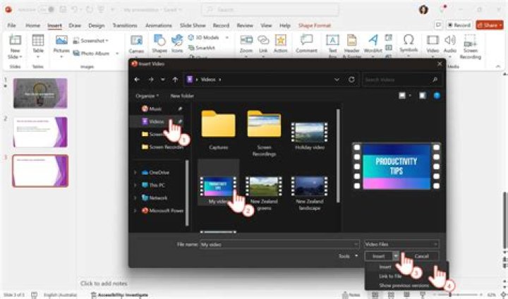 How do you add a video from camera roll to PowerPoint?