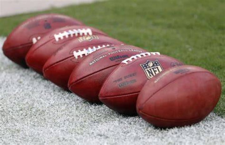 How many footballs are used in an NFL game?