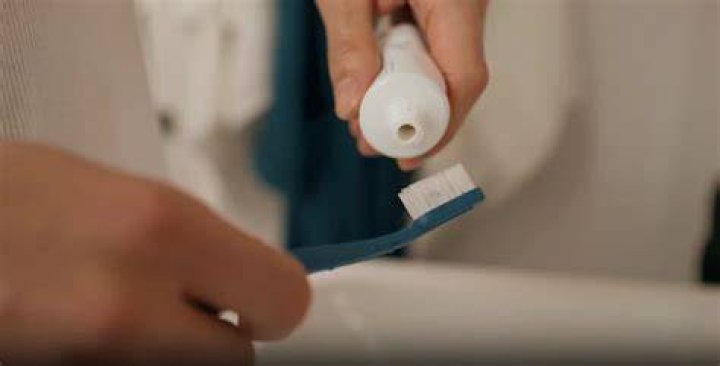 Is brushing without toothpaste OK?