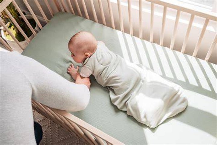 Is it OK if my 5 month old rolls over in his sleep?