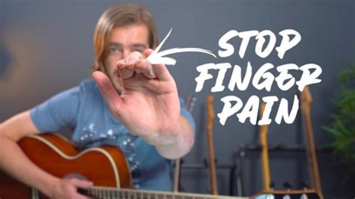 Should I stop playing guitar if my fingers hurt?