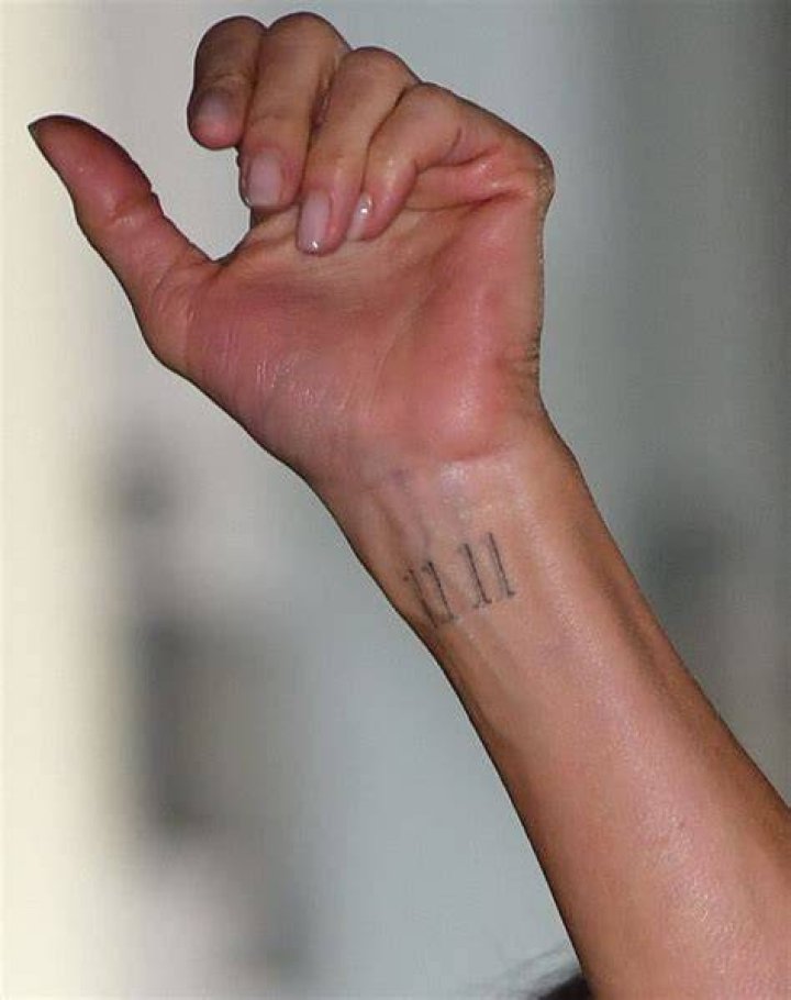 What is the tattoo on Jennifer Aniston wrist?