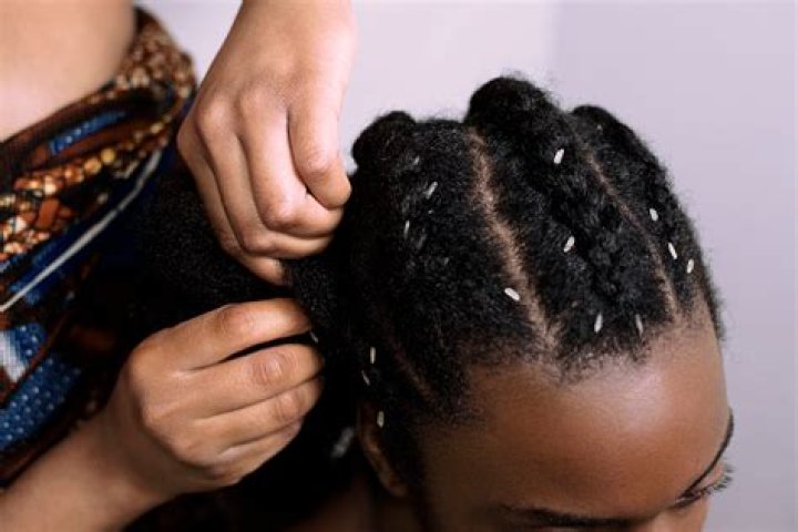 Why do Africans put rice in their hair?