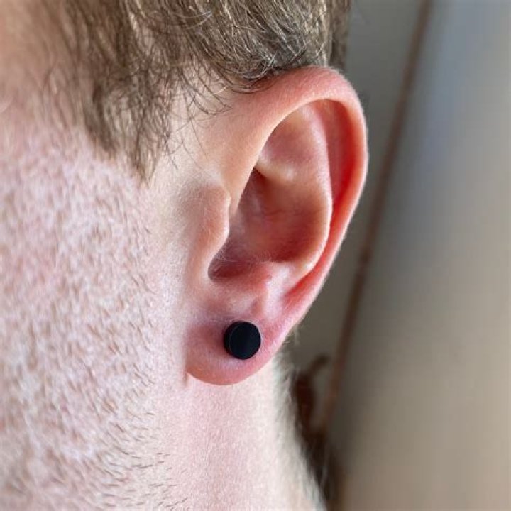 Why do my ears turn my earrings black?